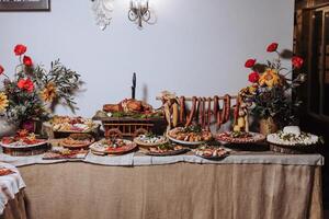 Cossack table. Banquet hall Meat treats for guests. Homemade cutouts. Pork tenderloin. Delicious meat cuts. Meat plate. Delicious compositions from smoked mint. Cottage cheese. photo