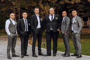 Wedding photography. The groom and his friends photo