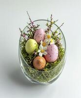 AI generated Easter eggs decoration in a glass oval container isolated  on white background photo