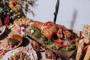 Cossack table. Banquet hall Meat treats for guests. Homemade cutouts. Pork tenderloin. Delicious meat cuts. Meat plate. Delicious compositions from smoked mint. Cottage cheese. photo