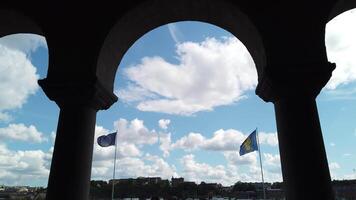 The flags of Stockholm and Europe fly together as a symbol of union. video