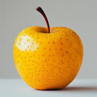 AI generated Ripe yellow green apple on a white background - AI generated image photo