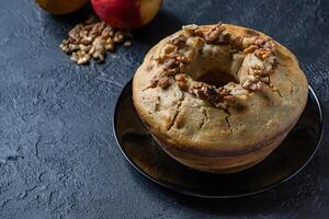 Cake with walnut, apple and orange to flavor. photo