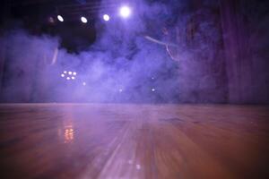 Smoke screen on the wooden floor of the theater stage. photo