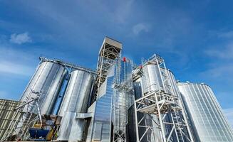 Warehouse for corn, wheat and barley storage. Long term grain depositing at modern factory. Closeup. photo