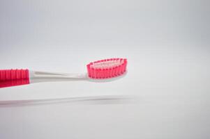 a toothbrush isolated on a white background photo