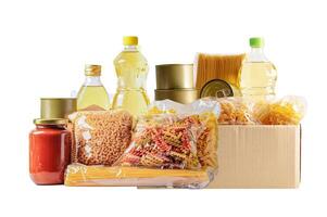 Foodstuffs in donation box isolated on white background for volunteer to help people. photo