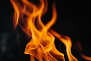 AI generated Flames on a dark background with generative ai photo