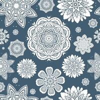 Ornate floral snowflakes seamless pattern vector