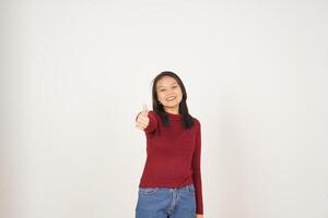 Young Asian woman in Red t-shirt Showing Thumb Up, Agree Concept isolated on white background photo