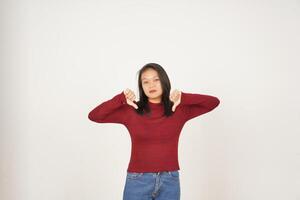 Young Asian woman in Red t-shirt Showing Thumb Down, Disagree concept  isolated on white background photo