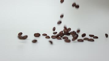 Coffee on white background, slow motion of coffee beans video