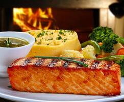 Grilled salmon with vegetables photo