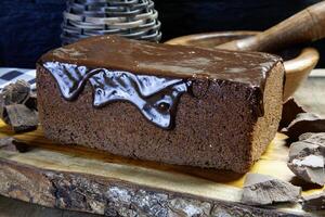 Chocolate cake with chocolate sauce photo