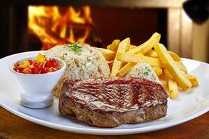 Picanha steak, french fries, rice and vinaigrette photo