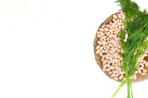 Fresh beans and green dill, ready for cooking photo