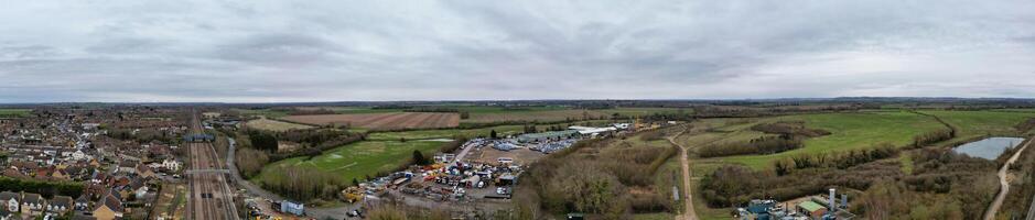 High Angle Panoramic View of Arseley Town of England UK. The Footage Was Captured During Cloudy and Rainy Day of Feb 28th, 2024 photo