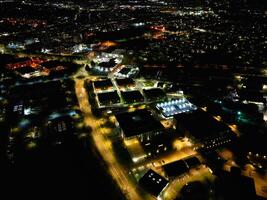 aéreo ver de iluminado watford ciudad de Inglaterra Reino Unido a noche. marzo tercero, 2024 foto