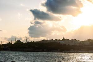 Istanbul background photo at sunset. Topkapi Palace and Hagia Sophia