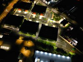 aéreo ver de iluminado watford ciudad de Inglaterra Reino Unido a noche. marzo tercero, 2024 foto