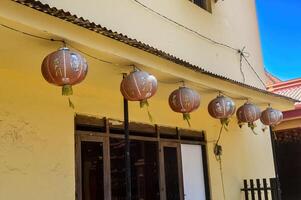 row of Chinese Lanterns in a Chinese village in Indonesia. photo