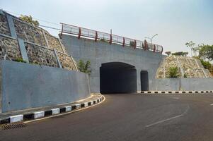 landscape of the outside of the tunnel underpass road on a hot day photo