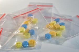 a collection of medication for schizophrenia in a plastic clip photo