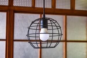 a lamp with a Japanese-style ring photo