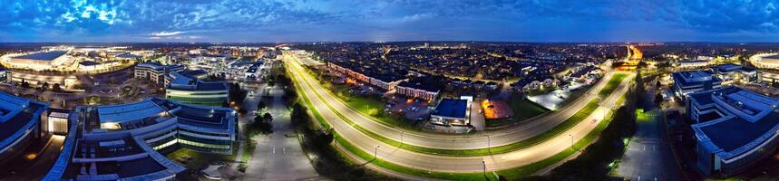 Aerial Panoramic view of Illuminated Central Hatfield City of England UK During Night. March 9th, 2024 photo