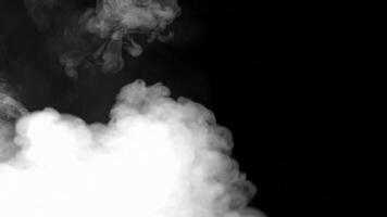 White smoke rising in the dark 4K background video