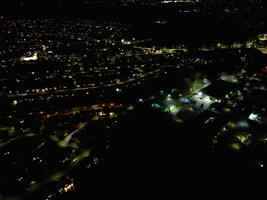 aéreo ver de iluminado watford ciudad de Inglaterra Reino Unido a noche. marzo tercero, 2024 foto