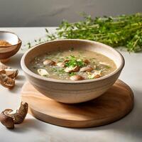 AI generated Bowl with tasty mushroom soup and ingredients on table against light background photo