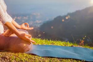 Close up Padmasana lotus pose photo