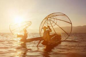 Traditional Burmese fisherman at Inle lake, Myanmar photo
