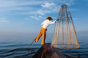 Traditional Burmese fisherman at Inle lake, Myanmar photo