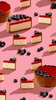 Food photo. Cheesecake with strawberry jam and blueberries with hard shadows. sweet concept pattern on pink photo