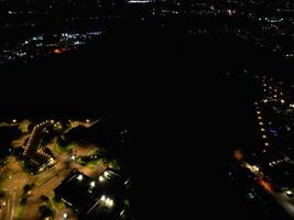 aéreo ver de iluminado watford ciudad de Inglaterra Reino Unido a noche. marzo tercero, 2024 foto