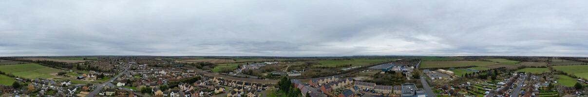High Angle Panoramic View of Arseley Town of England UK. The Footage Was Captured During Cloudy and Rainy Day of Feb 28th, 2024 photo