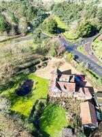 Aerial View of British Countryside and Agricultural Farm Land at Village of England UK. March 1st, 2024 photo