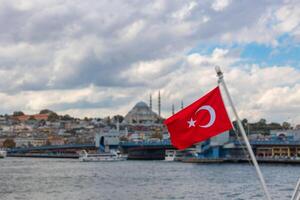 Turkish Flag and Istanbul on the background. photo