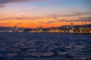 Istanbul view at sunset. Istanbul cityscape from a ferry. photo