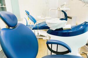 An empty chair in the dentist's office. Empty dentist's office photo