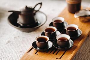 Preparing for a tea ceremony with a large company photo