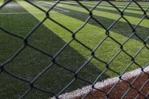Soccer or football field behind the fences. Banned from football concept photo