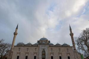 Bayezid or Beyazit Mosque view with cloudy sky. photo