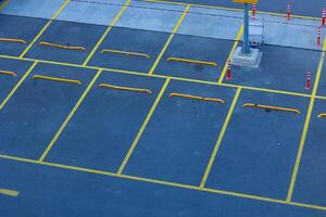 Empty parking lots in a car park. photo