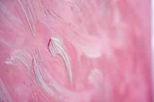 Abstract acrylic painting background with pink and white hand strokes photo