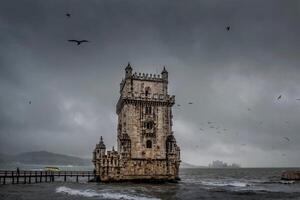 Lisbon, Portugal at Belem Tower on the Tagus River photo