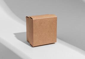Kraft carton box cover mockup, square shape, small little mini cardboard package photo