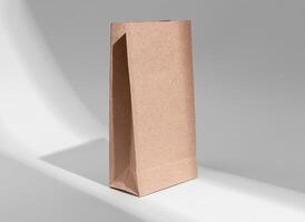 Kraft paper bag mockup. Eco beige pouch, package, vertical packet photo
